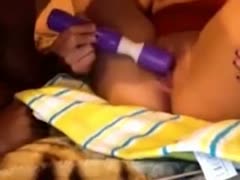 A friend recommends watching his evil, dark-brown girlfriend tease her pussy.